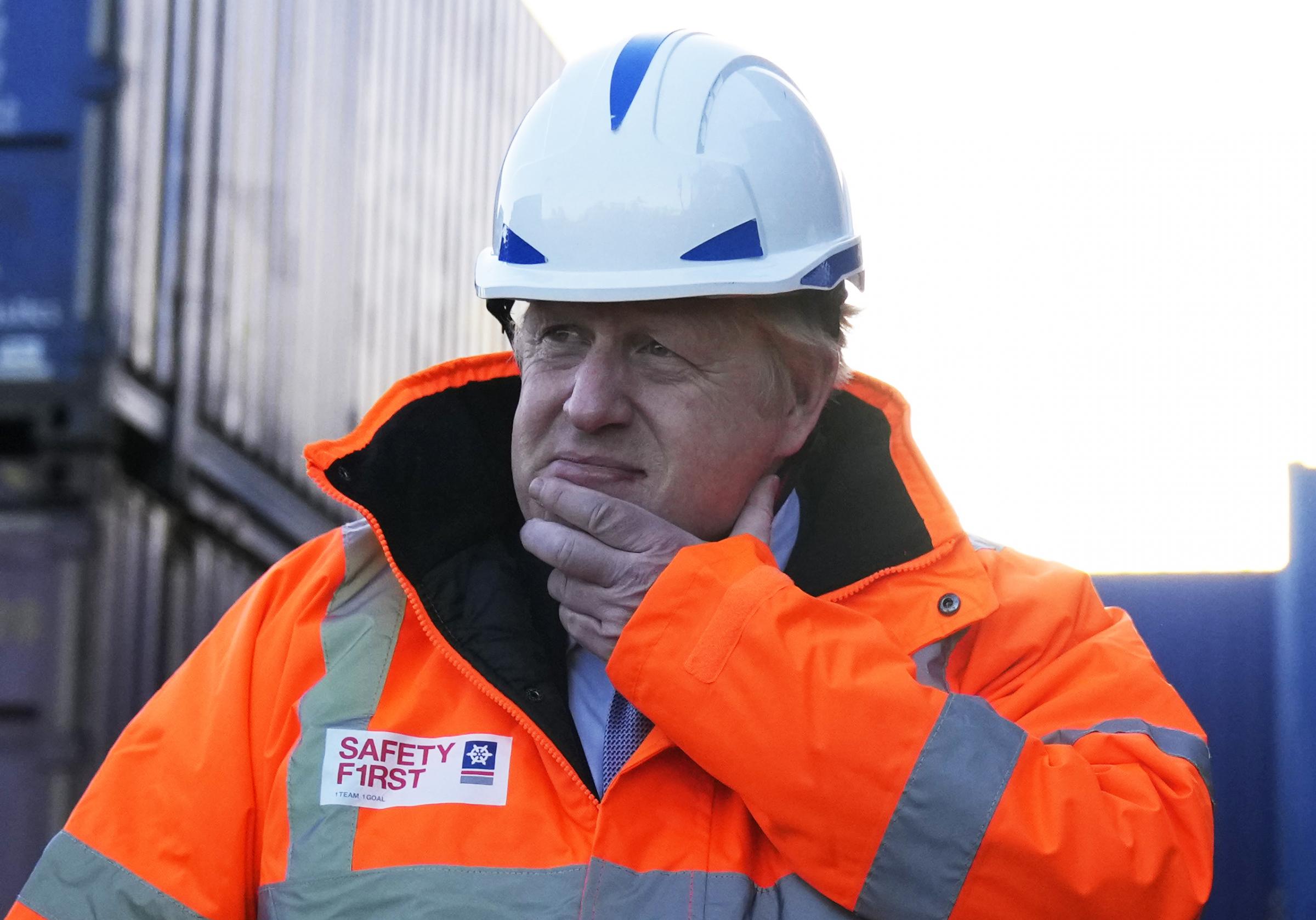 Prime Minister Boris Johnson drives a forklift as he visits the Tilbury Docks in Essex. Picture date: Monday January 31, 2022.